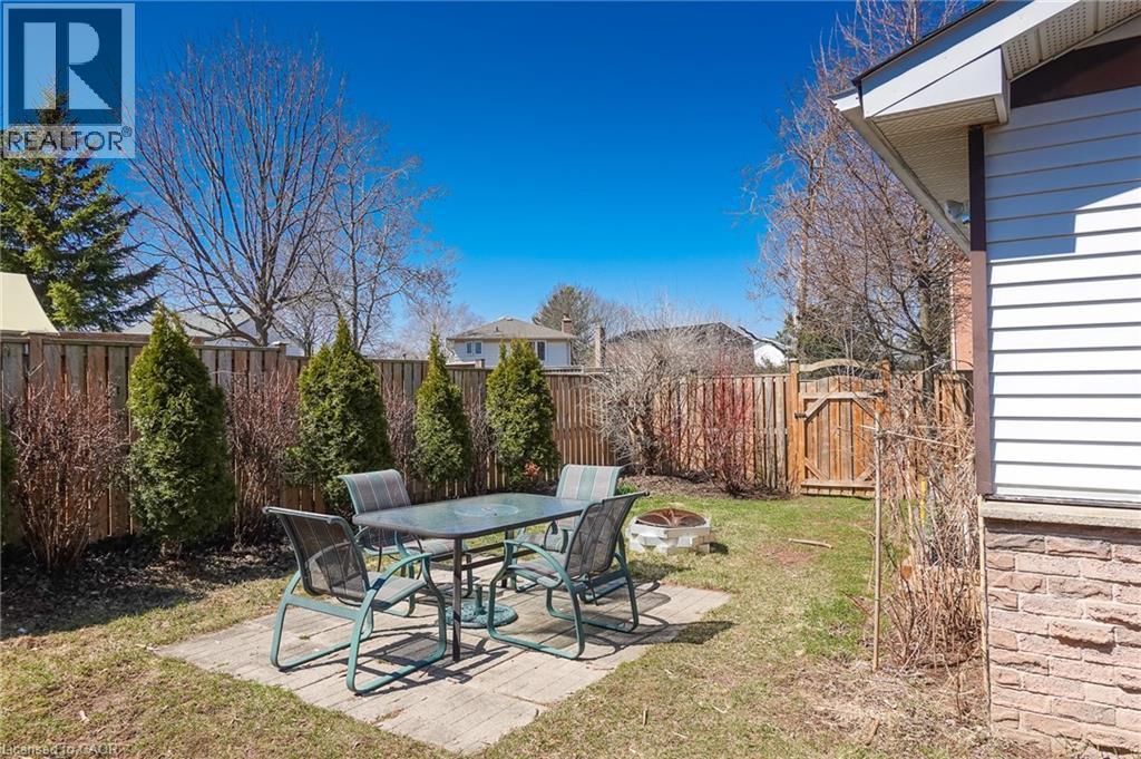 Fenced backyard with a patio area - 96 Pathfinder Crescent, Kitchener, ON - Outdoor