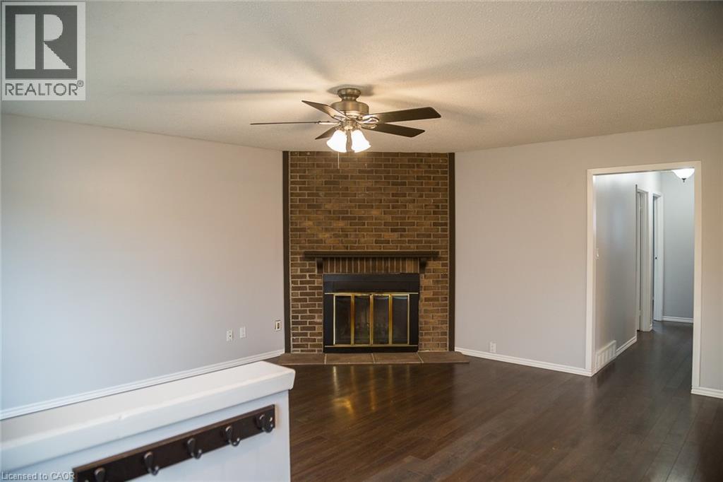 Mainfloor living room - 96 Pathfinder Crescent, Kitchener, ON - Indoor Photo Showing Living Room With Fireplace
