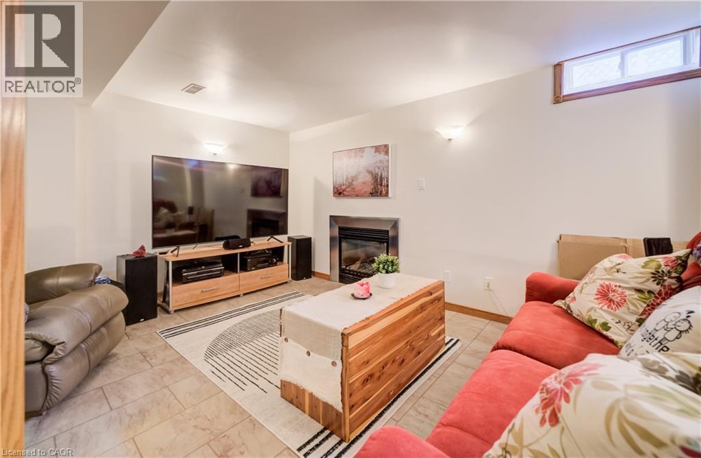 150 Bayne Crescent, Cambridge, ON - Indoor Photo Showing Living Room With Fireplace