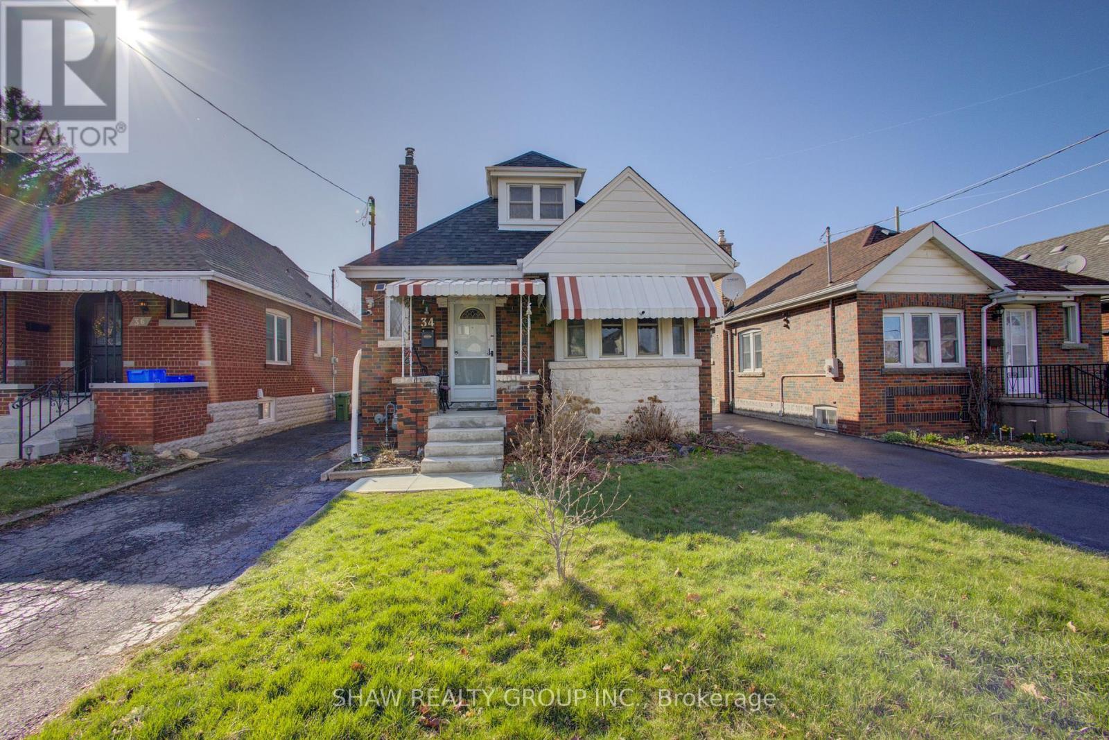 34 Barons Avenue S, Hamilton, ON - Outdoor With Facade