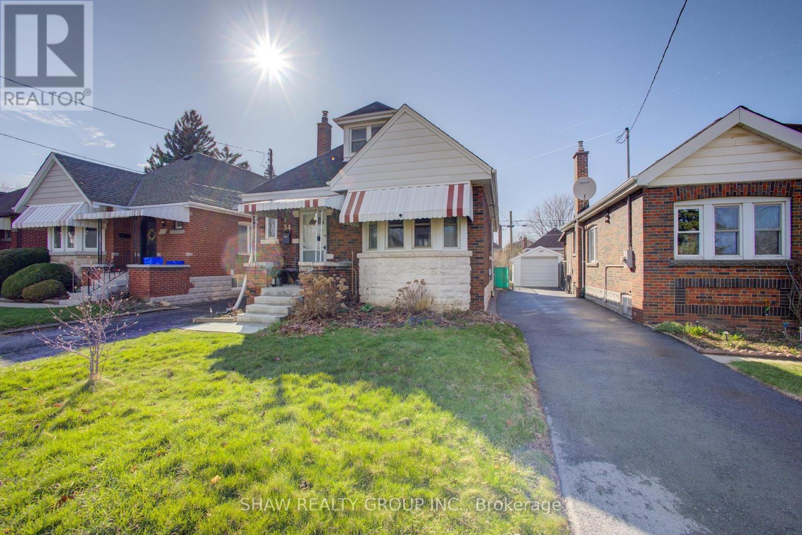 34 Barons Avenue S, Hamilton, ON - Outdoor With Facade