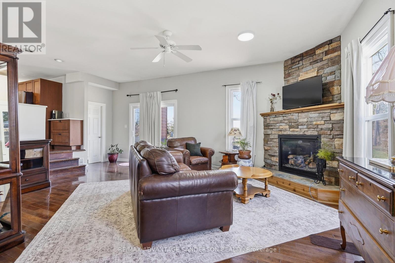 22476 Coldstream Road, Middlesex Centre, ON - Indoor Photo Showing Living Room With Fireplace