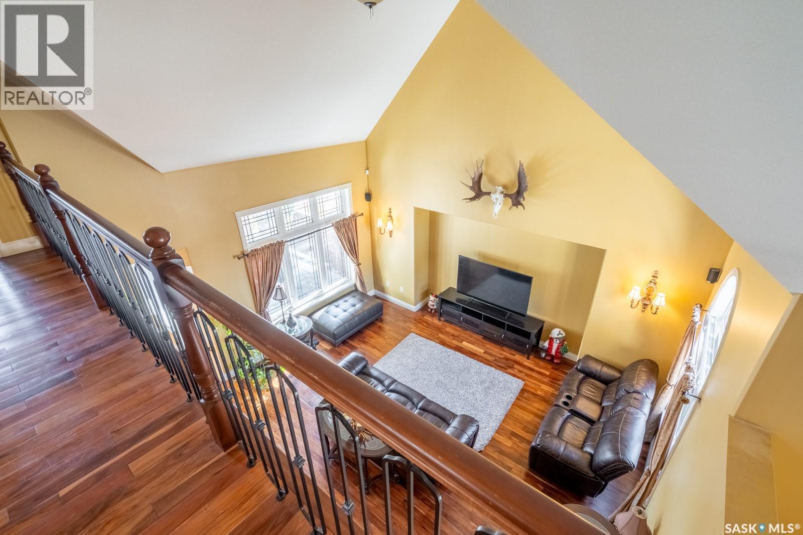 2514 Broderick Road, Regina, SK - Indoor Photo Showing Other Room With Fireplace
