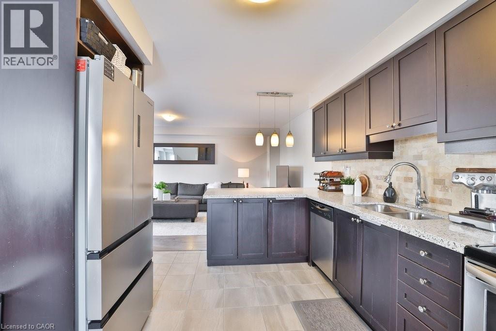 1133 Duignan Crescent, Milton, ON - Indoor Photo Showing Kitchen With Stainless Steel Kitchen With Double Sink With Upgraded Kitchen