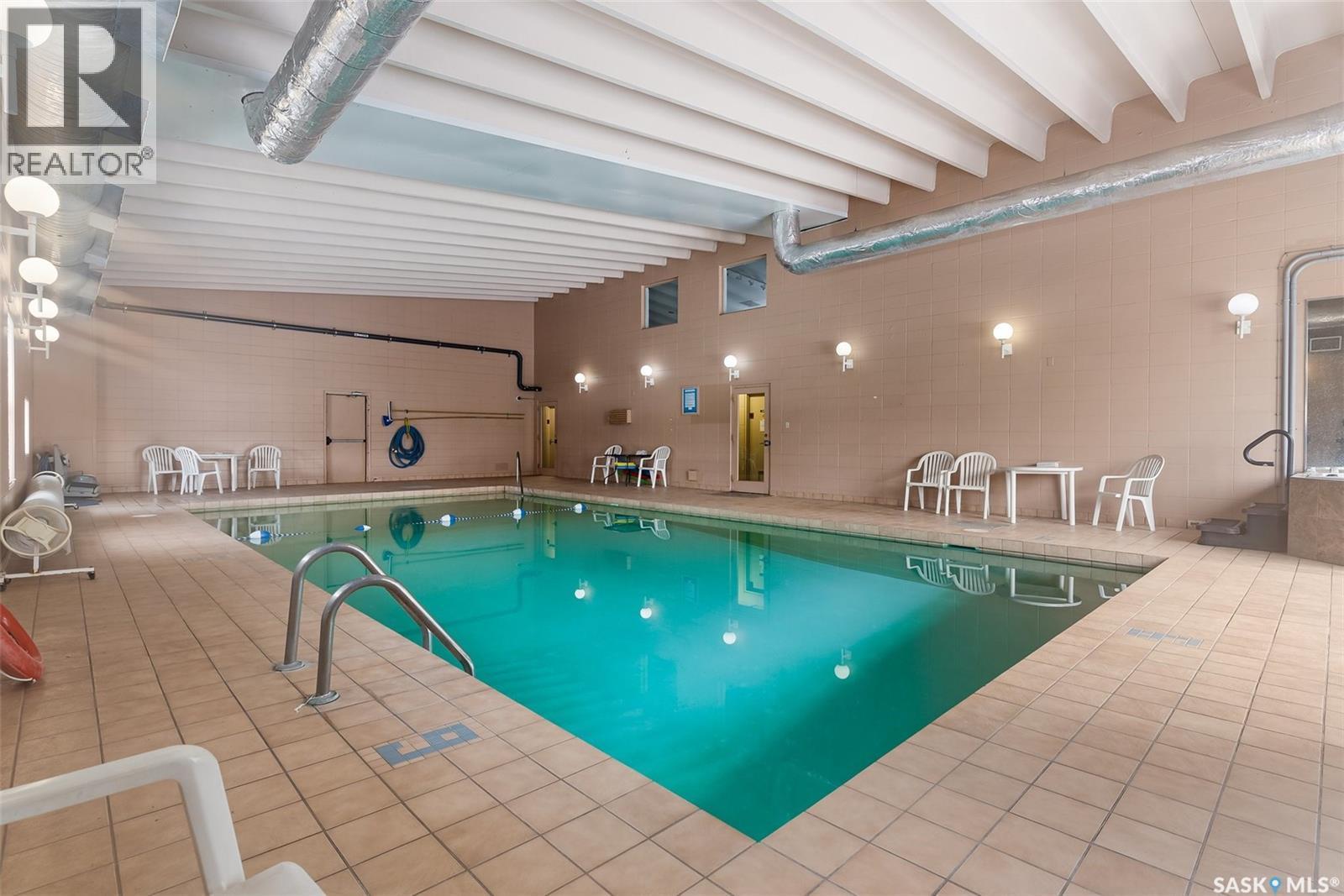 526 65 Westfield Drive, Regina, SK - Indoor Photo Showing Other Room With In Ground Pool