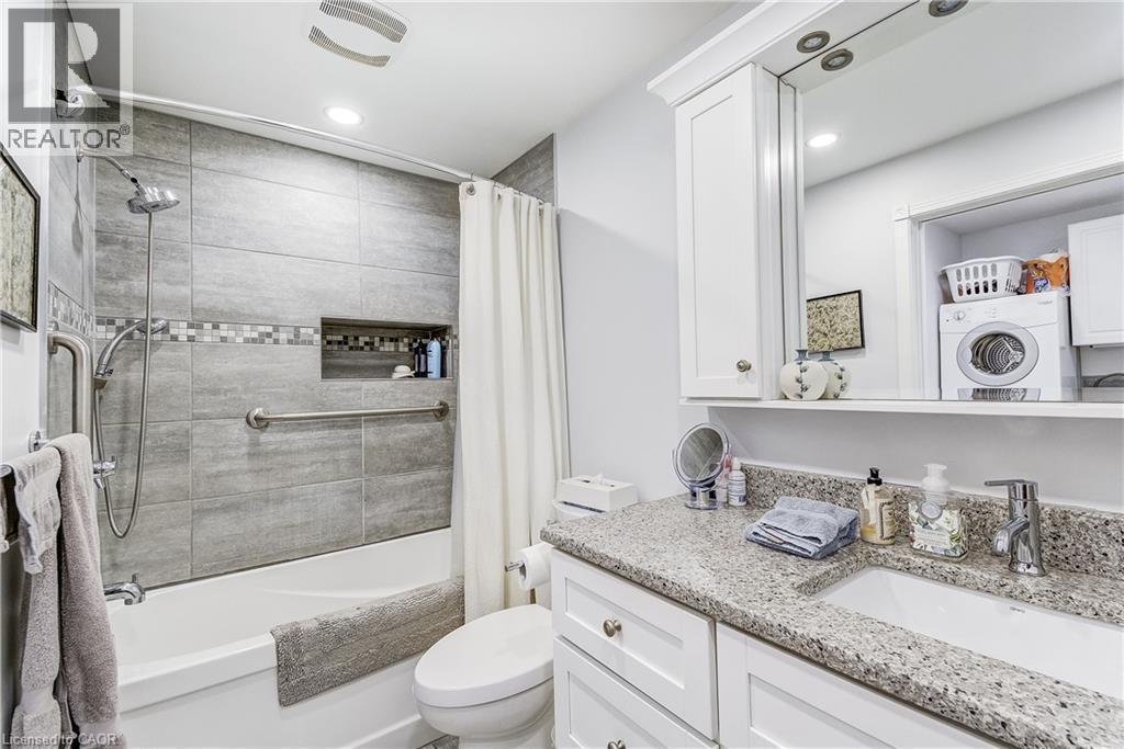 Full bathroom featuring vanity, washer / clothes dryer, shower / tub combo with curtain, and recessed lighting - 315 Aberdeen Avenue, Hamilton, ON - Indoor Photo Showing Bathroom