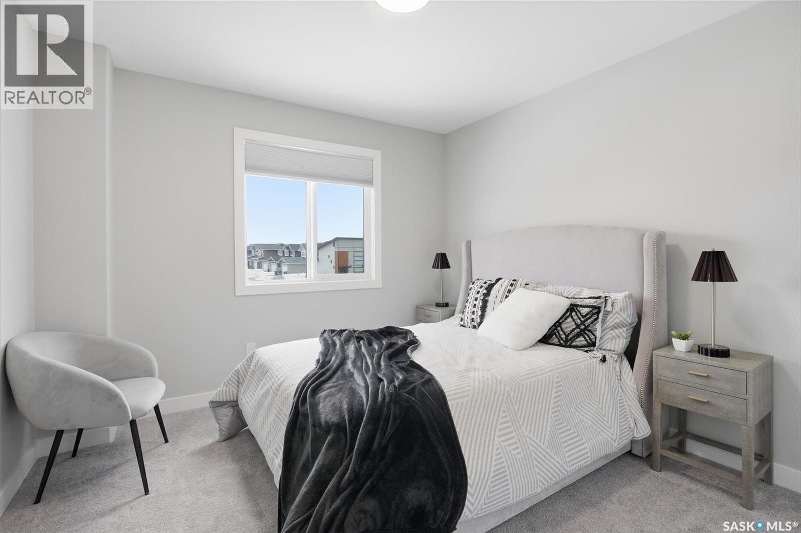 242 Kostiuk Crescent, Saskatoon, SK - Indoor Photo Showing Bedroom