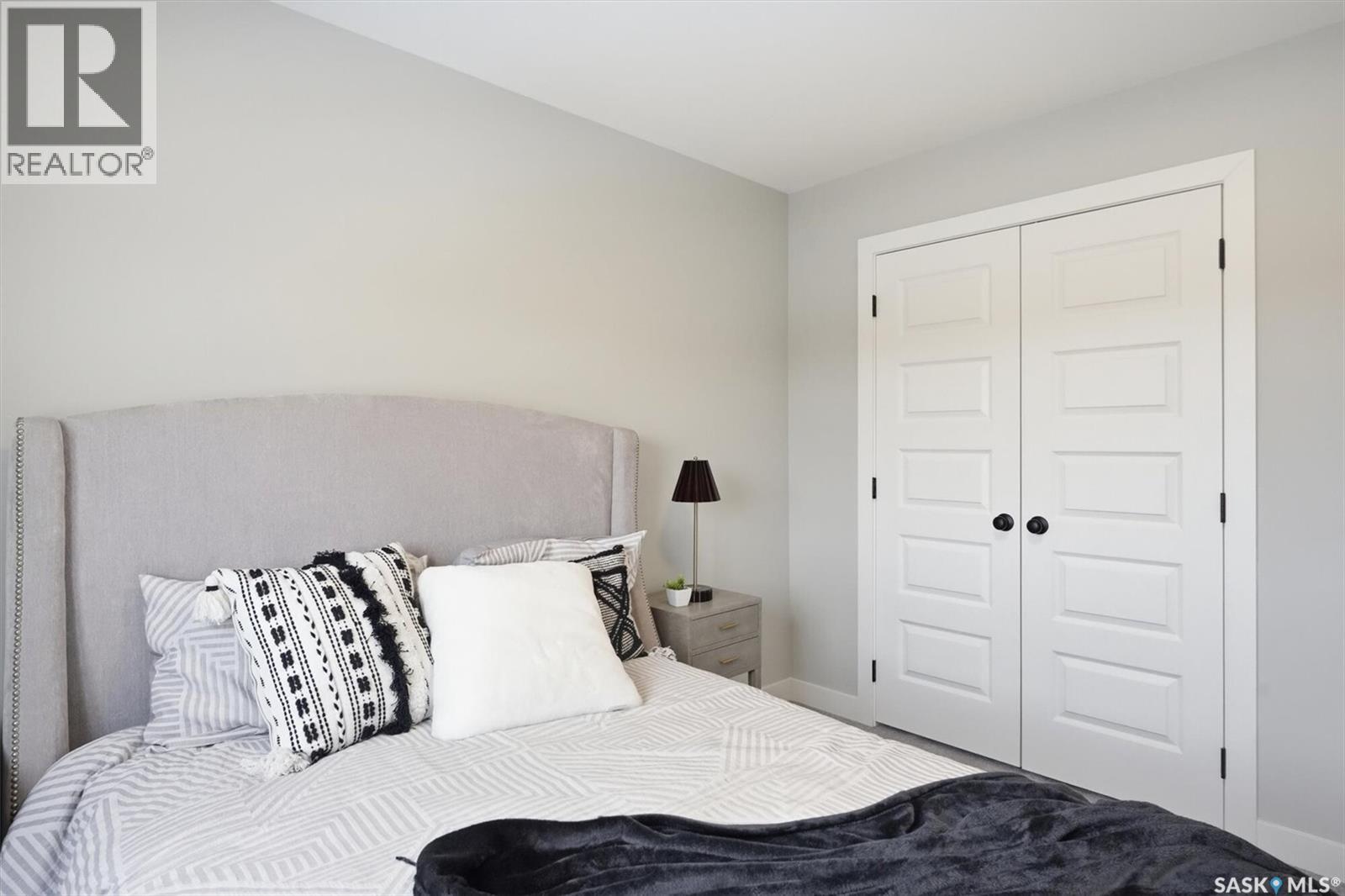 242 Kostiuk Crescent, Saskatoon, SK - Indoor Photo Showing Bedroom
