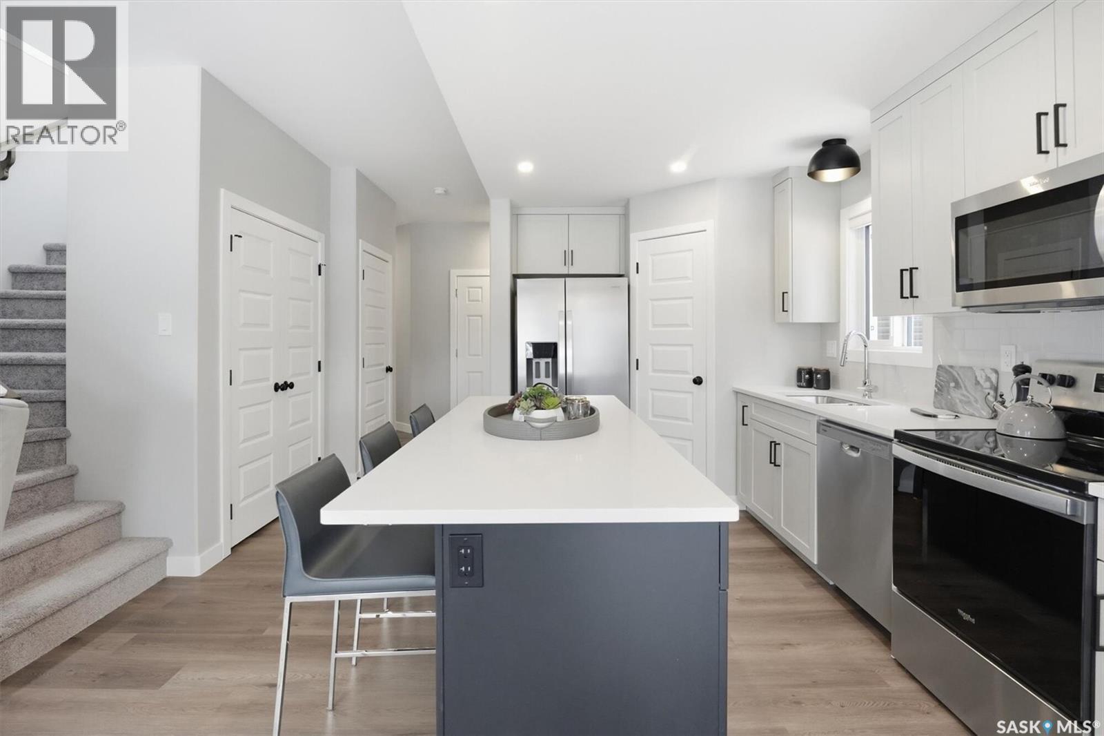 242 Kostiuk Crescent, Saskatoon, SK - Indoor Photo Showing Kitchen With Upgraded Kitchen