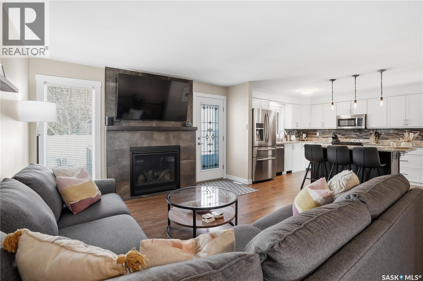 2206 Mahony Crescent, Regina, SK - Indoor Photo Showing Living Room With Fireplace