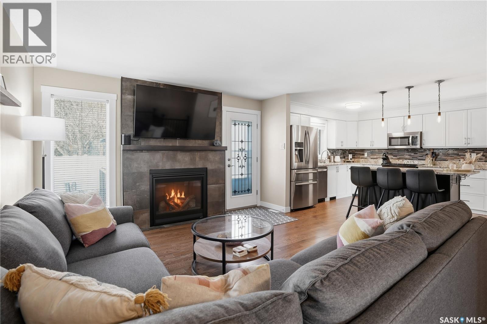 2206 Mahony Crescent, Regina, SK - Indoor Photo Showing Living Room With Fireplace