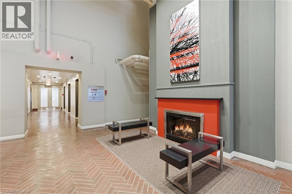 66 Bay Street S Unit# 510, Hamilton, ON - Indoor With Fireplace