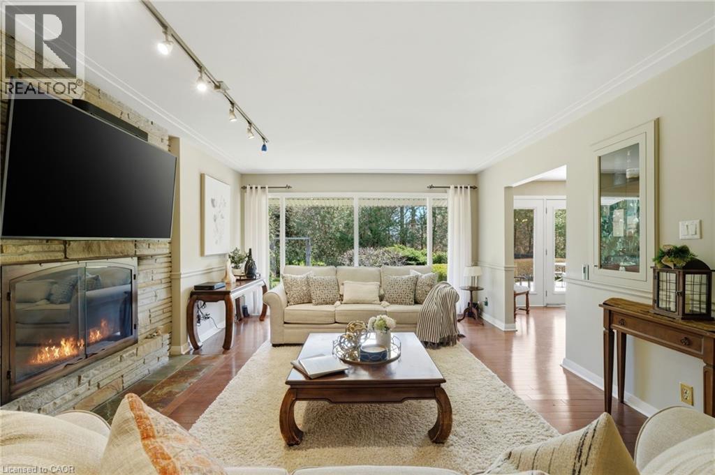 6 Summit Circle, Simcoe, ON - Indoor Photo Showing Living Room With Fireplace