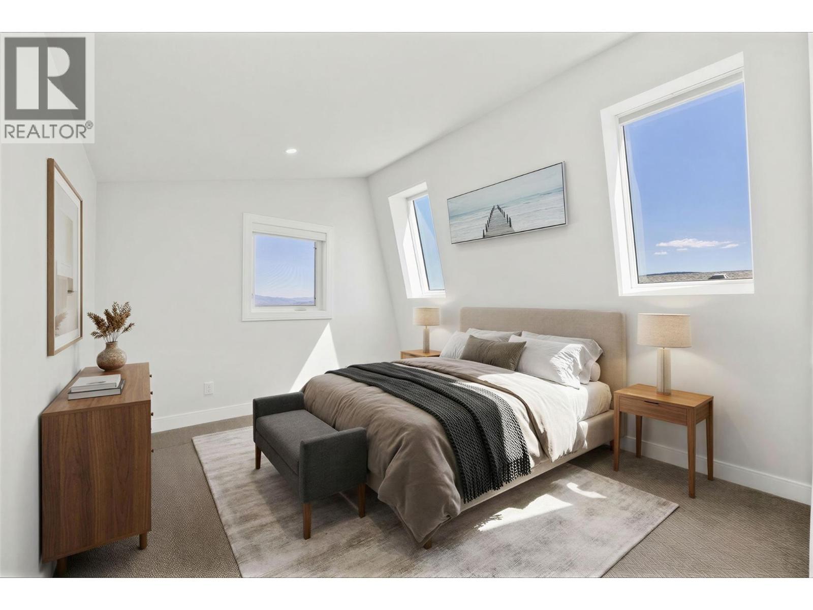 Secondary primary retreat... a top floor haven (virtually staged) - 1860 Blue Bunch Court, Kelowna, BC - Indoor Photo Showing Bedroom