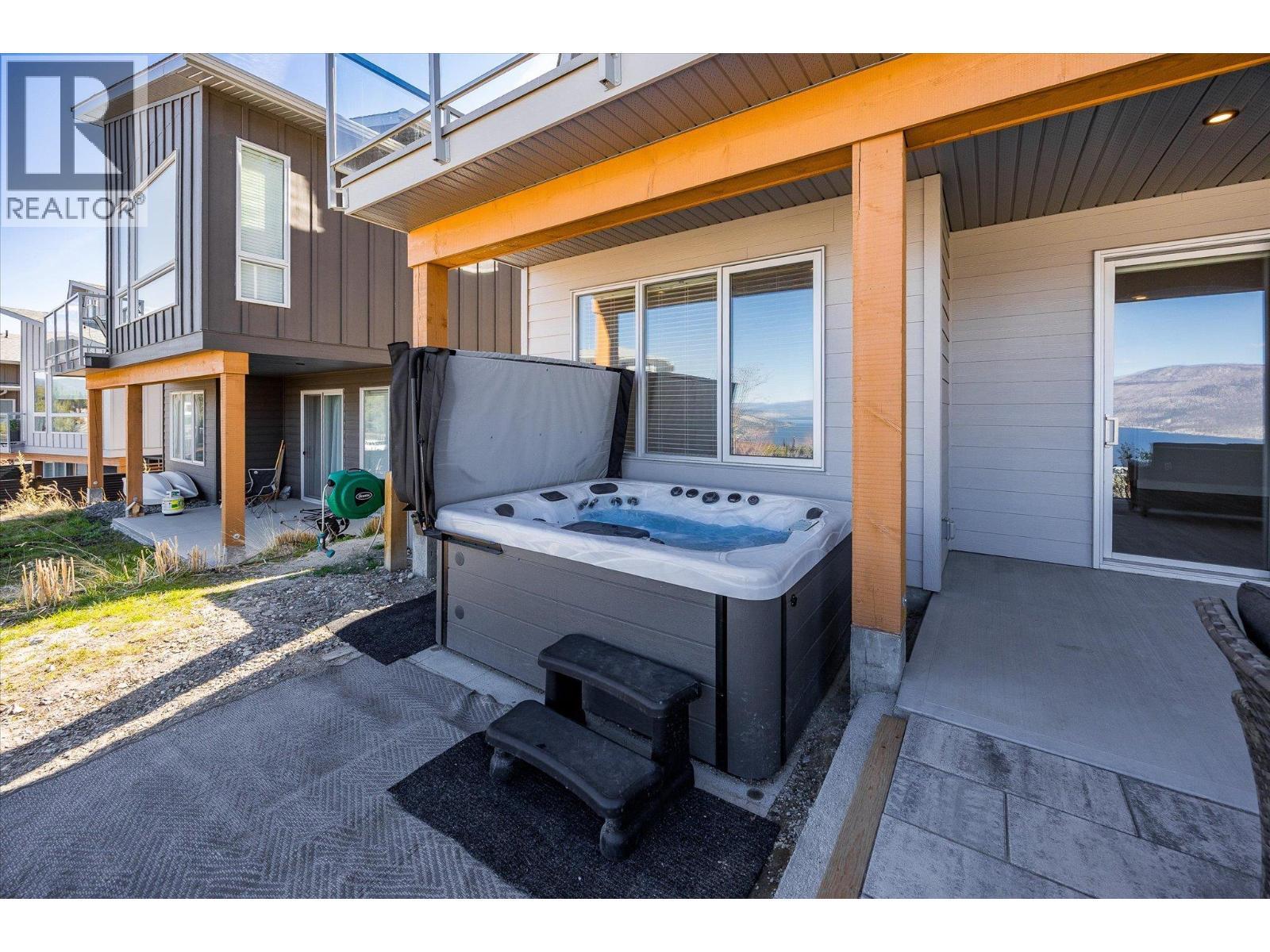 Ample room for a hot tub - 1860 Blue Bunch Court, Kelowna, BC - Outdoor With Deck Patio Veranda With Exterior
