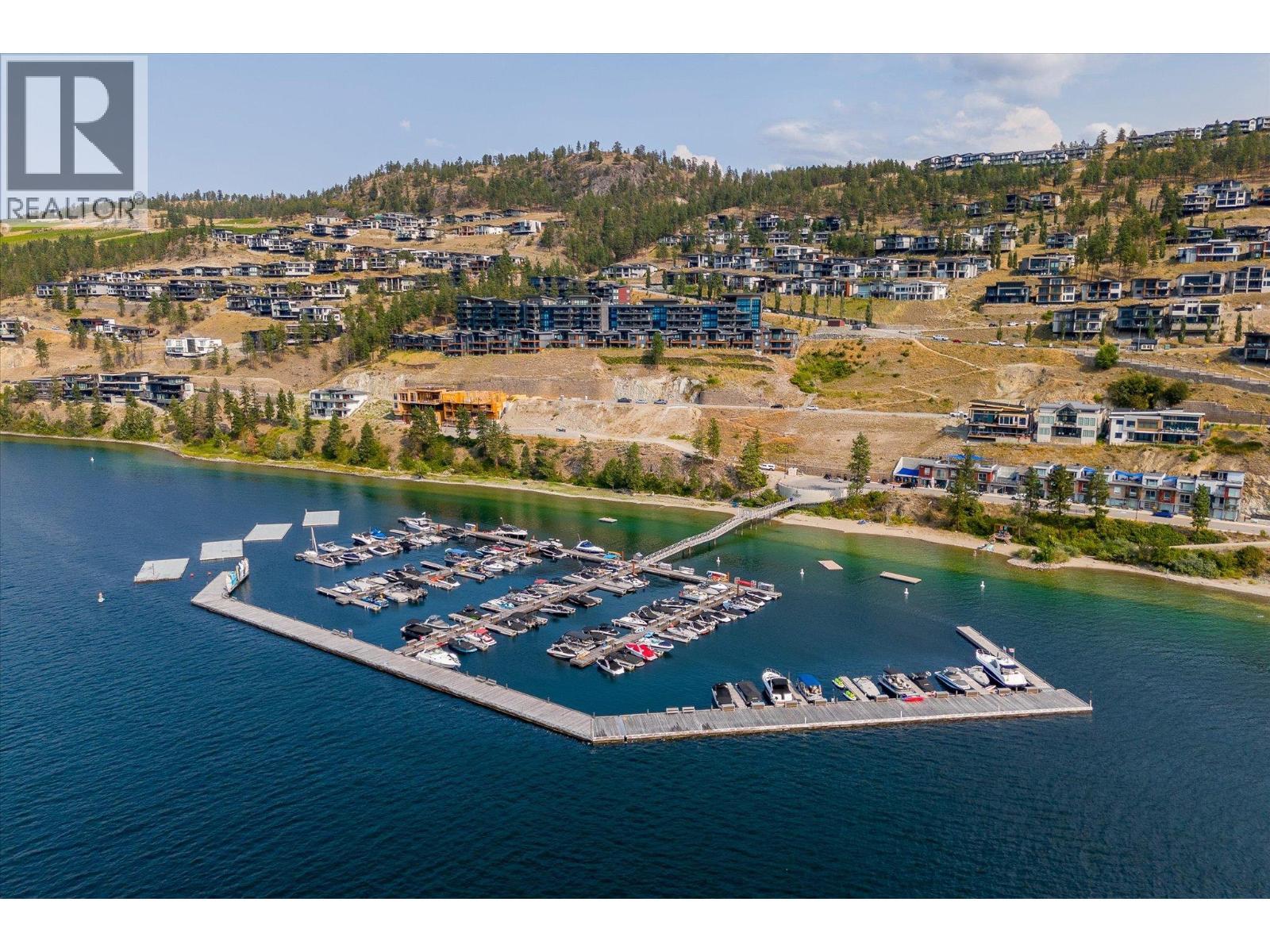 Marina for those beautiful summer days - 1860 Blue Bunch Court, Kelowna, BC - Outdoor With Body Of Water With View