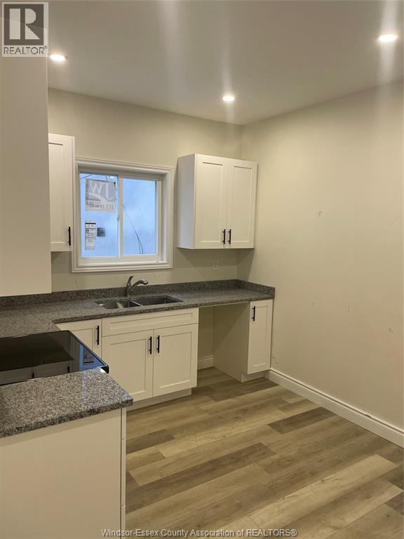 647 Janette Unit# B, Windsor, ON - Indoor Photo Showing Kitchen With Double Sink