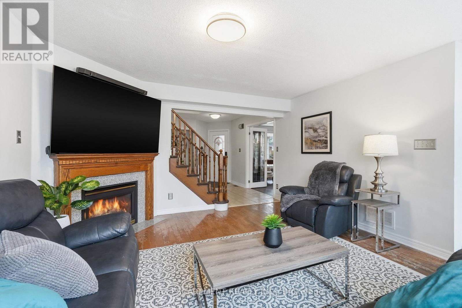 5189 Blue Spruce Avenue, Burlington, ON - Indoor Photo Showing Living Room With Fireplace