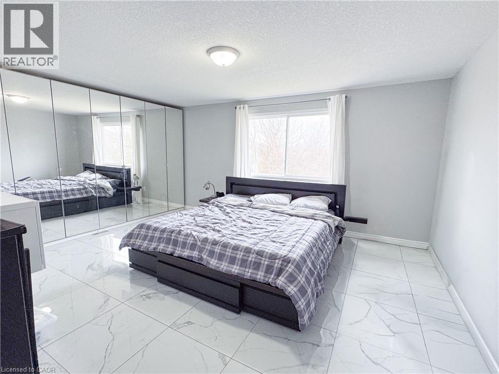 Primary Bedroom - 215 Pine Valley Drive, Kitchener, ON - Indoor Photo Showing Bedroom