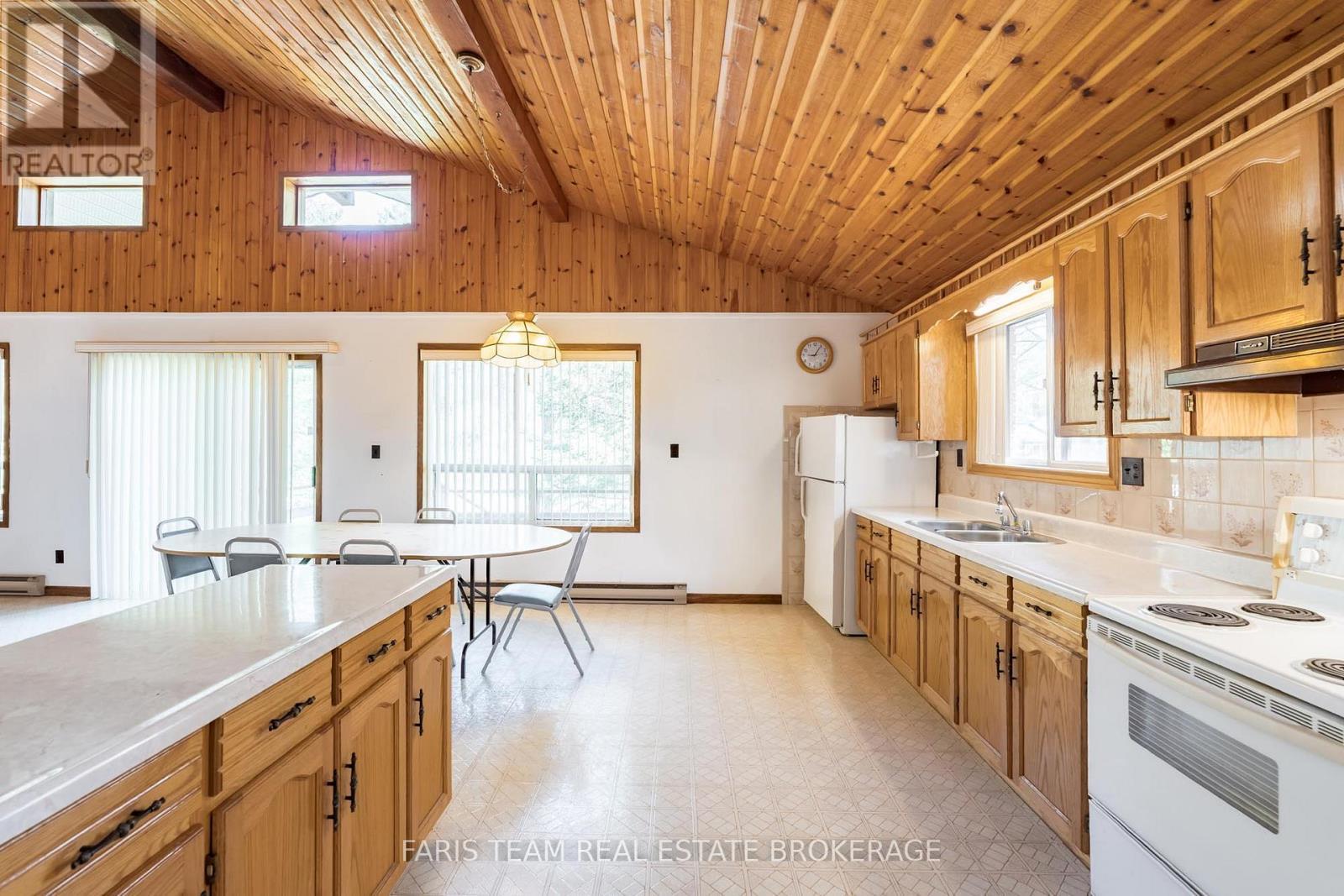 39 Rosemary Road, Tiny, ON - Indoor Photo Showing Kitchen With Double Sink