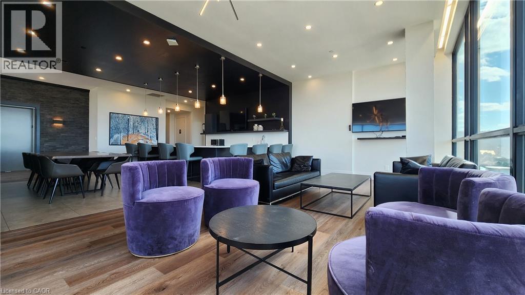 Indoor rooftop lounge & bar - 101 Locke Street Unit# 511, Hamilton, ON - Indoor Photo Showing Living Room