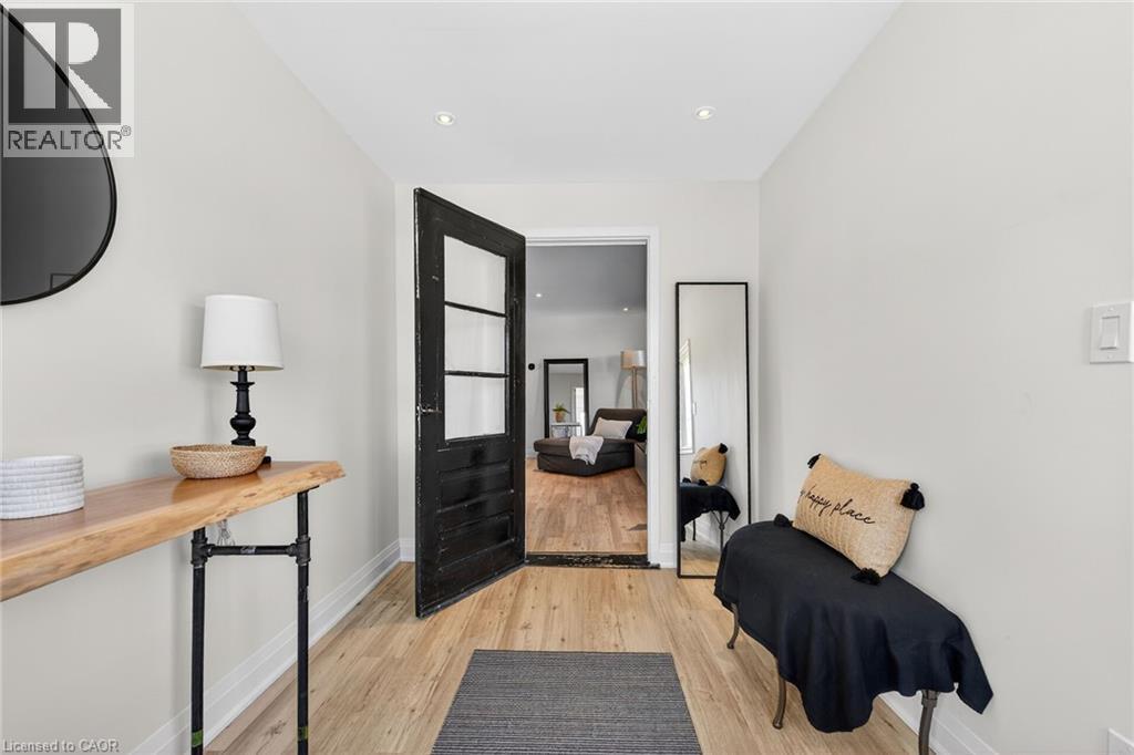 Foyer with light wood-type flooring - 844 Upper Wellington Street, Hamilton, ON - Indoor