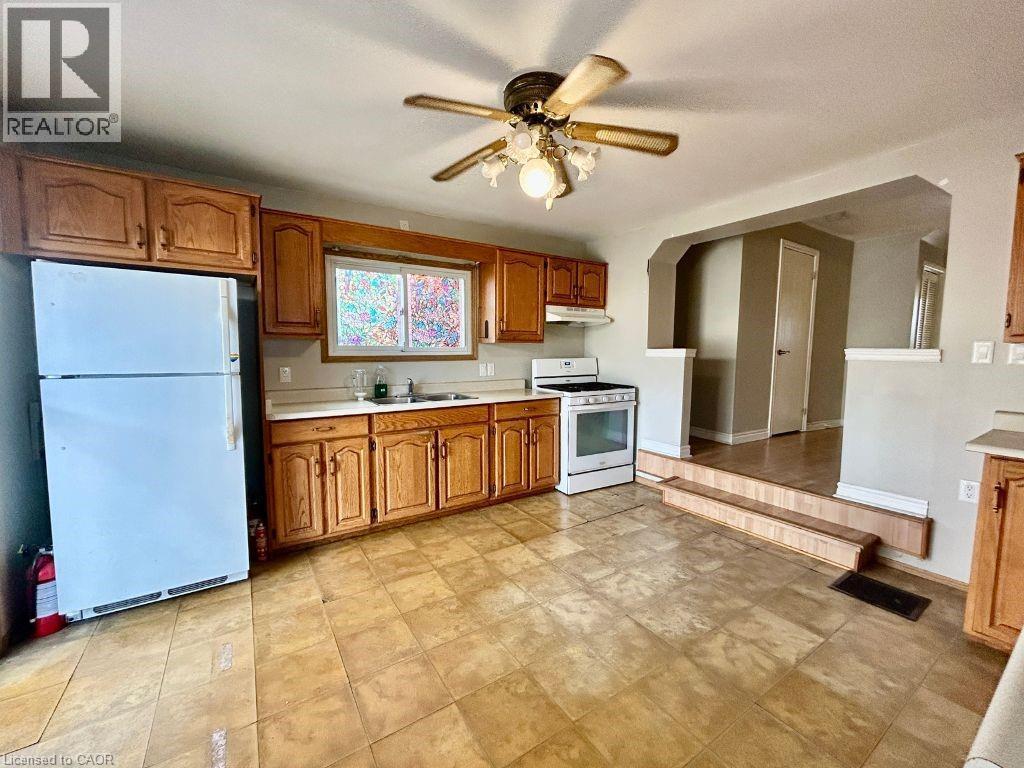 153 Cameron Avenue N, Hamilton, ON - Indoor Photo Showing Kitchen With Double Sink