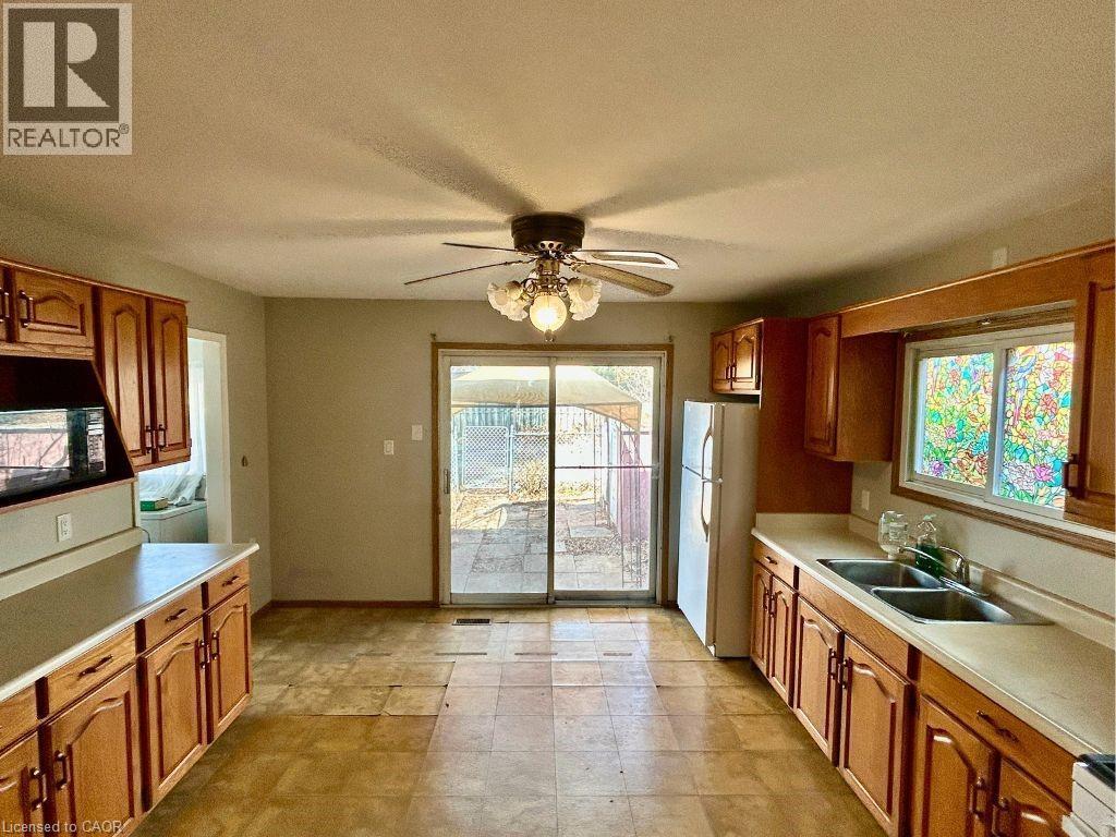 153 Cameron Avenue N, Hamilton, ON - Indoor Photo Showing Kitchen With Double Sink