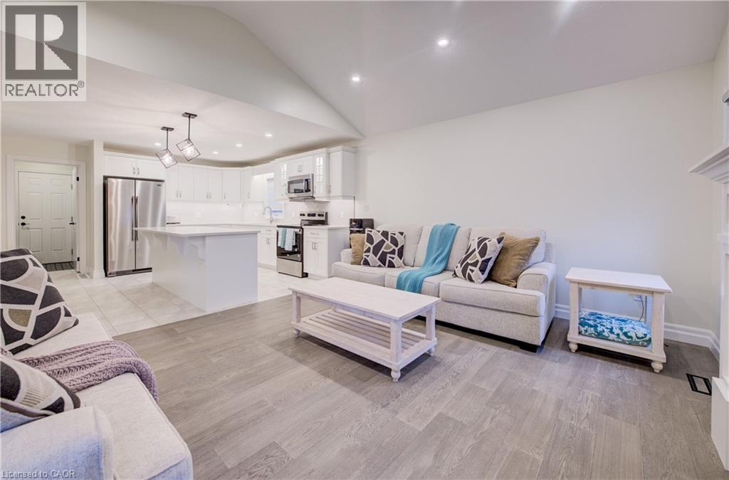 Cathedral Ceiling and LED Pot Lights - 4 Livingston Drive, Tillsonburg, ON - Indoor Photo Showing Living Room