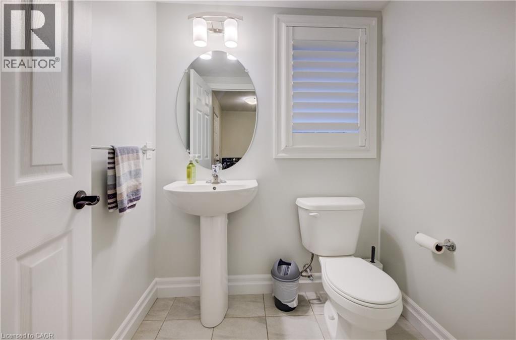 patterned flooring - 4 Livingston Drive, Tillsonburg, ON - Indoor Photo Showing Bathroom