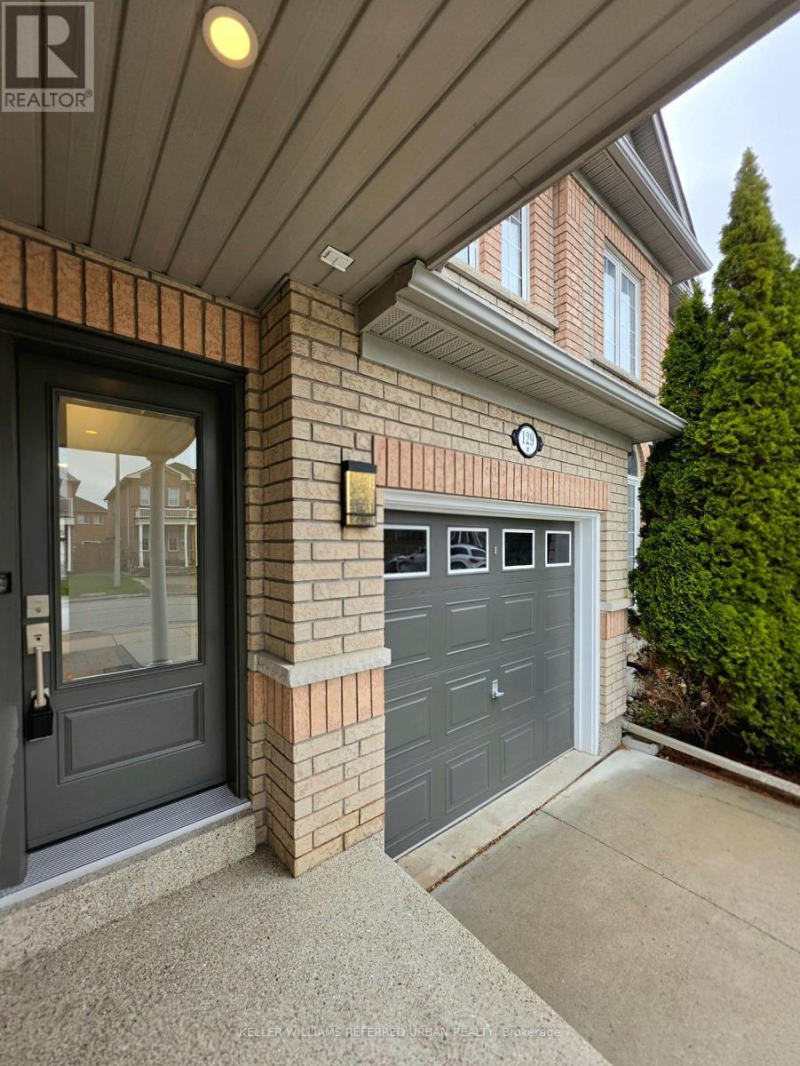 Brand new entrance door colour matched garage door - 129 Dolce Crescent, Vaughan, ON - Outdoor With Exterior
