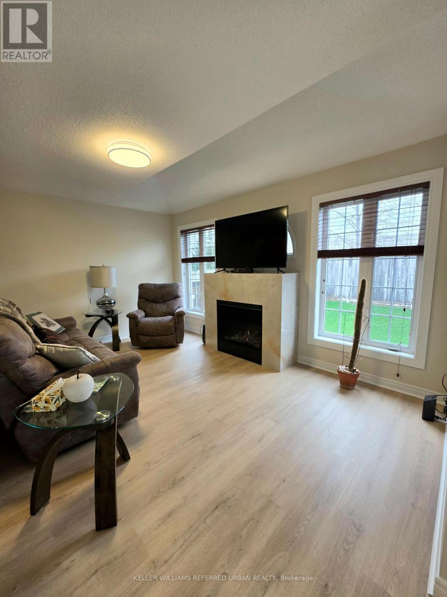 New fireplace and Marble mantle - 129 Dolce Crescent, Vaughan, ON - Indoor Photo Showing Living Room With Fireplace
