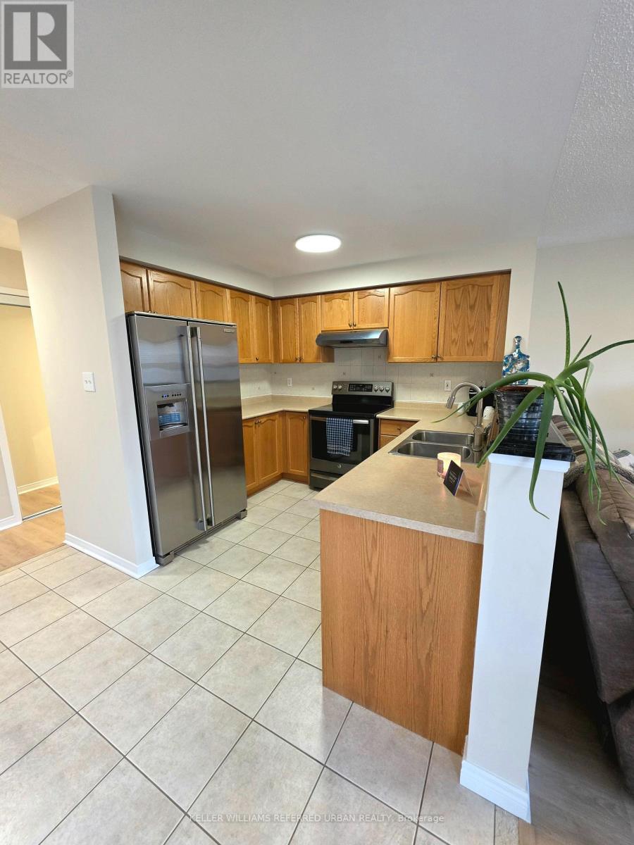 Even the tile grout is spotless - 129 Dolce Crescent, Vaughan, ON - Indoor Photo Showing Kitchen With Double Sink