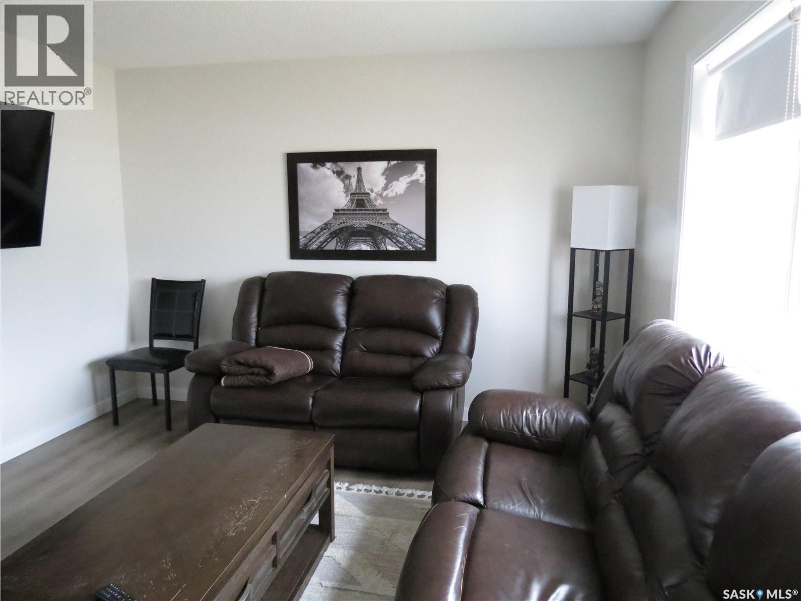 19 Merlin Crescent, Regina, SK - Indoor Photo Showing Living Room