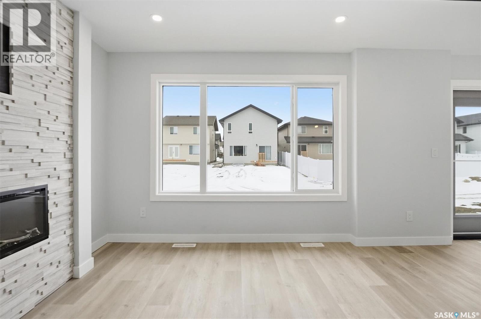 262 Kostiuk Crescent, Saskatoon, SK - Indoor With Fireplace