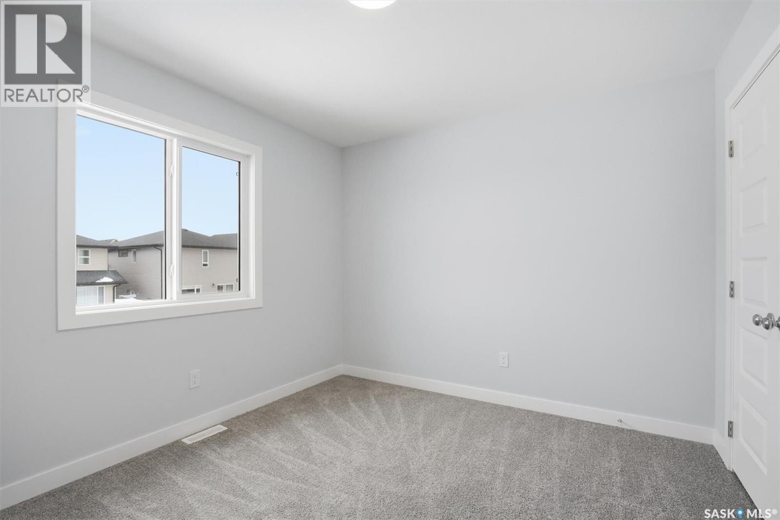 262 Kostiuk Crescent, Saskatoon, SK - Indoor Photo Showing Other Room