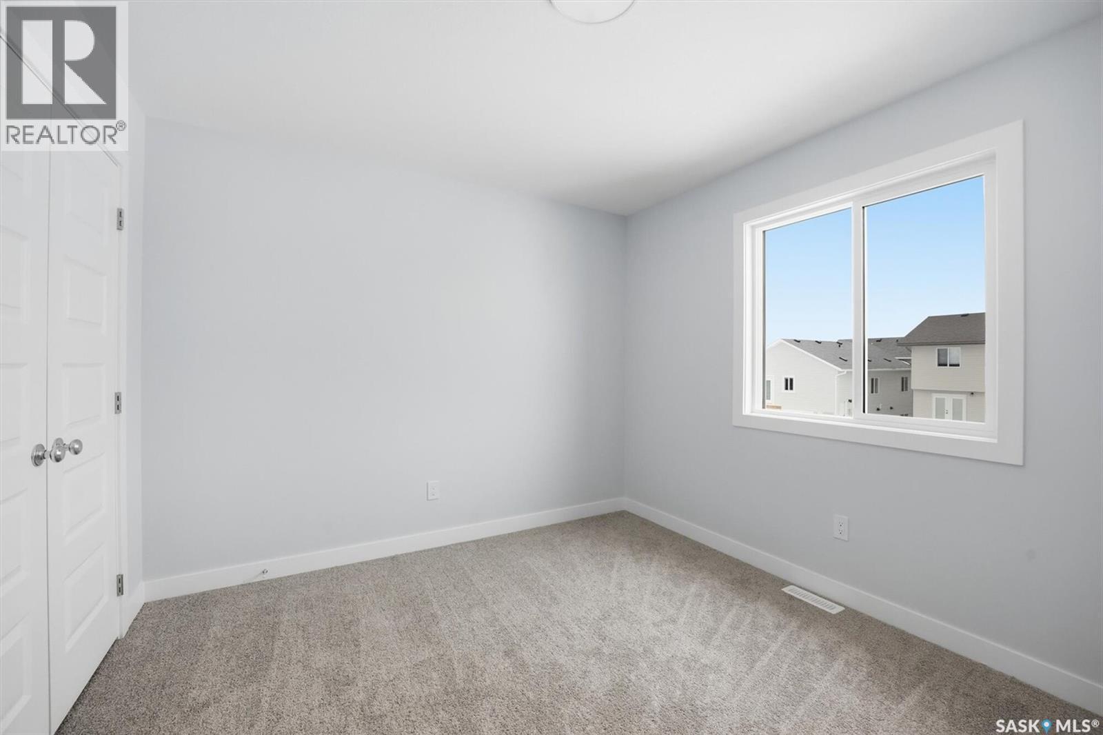 262 Kostiuk Crescent, Saskatoon, SK - Indoor Photo Showing Other Room