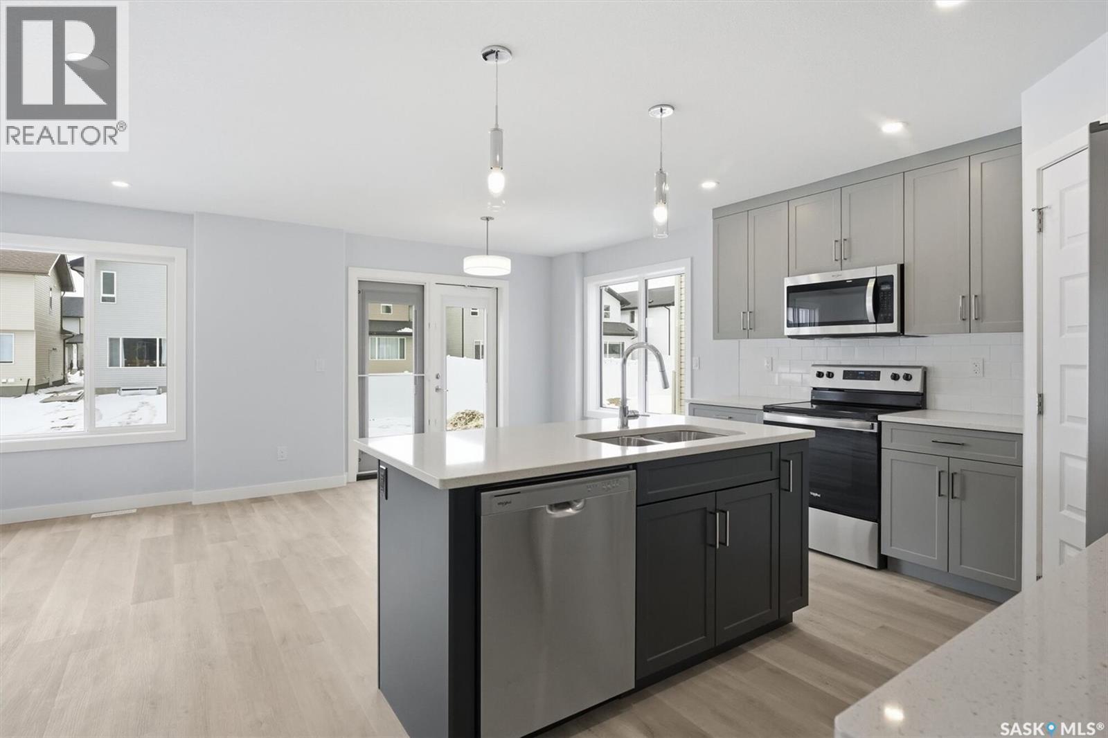 262 Kostiuk Crescent, Saskatoon, SK - Indoor Photo Showing Kitchen With Double Sink With Upgraded Kitchen