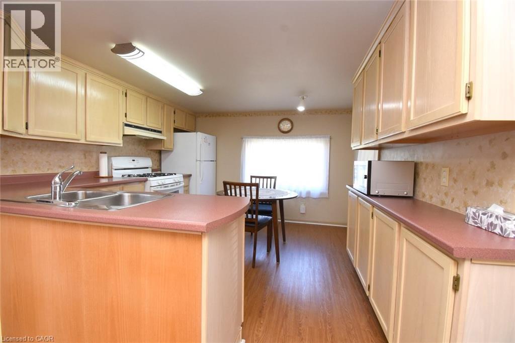 57 Concession 12 E Unit# 101, Flamborough, ON - Indoor Photo Showing Kitchen With Double Sink