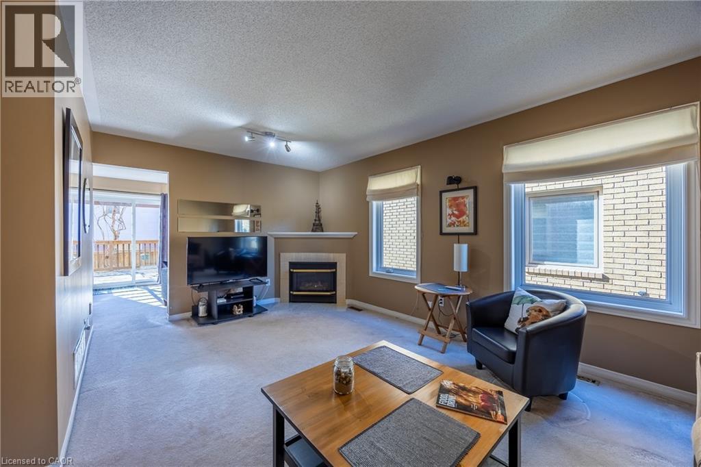 55 Grindstone Way, Waterdown, ON - Indoor Photo Showing Living Room With Fireplace
