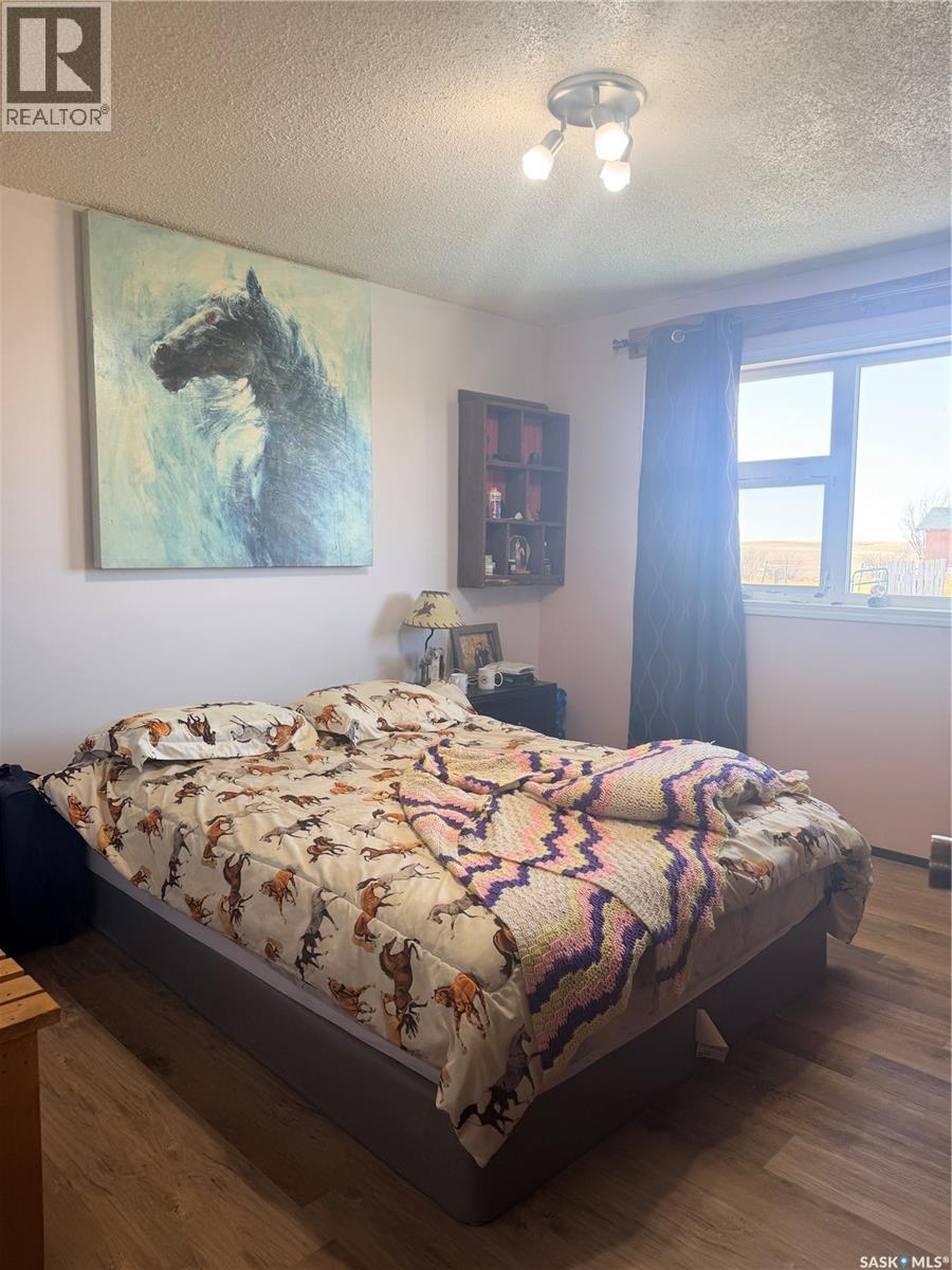 Mezzo Acreage Grid Road, Tompkins, SK - Indoor Photo Showing Bedroom