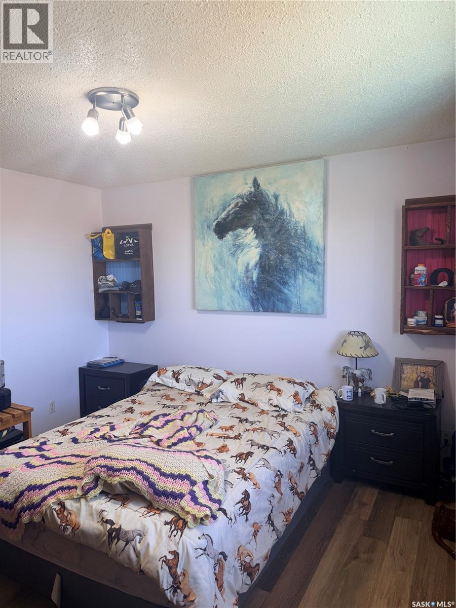 Mezzo Acreage Grid Road, Tompkins, SK - Indoor Photo Showing Bedroom