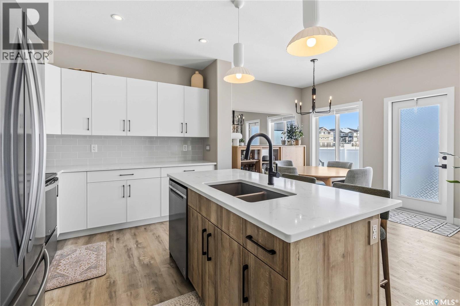 26 625 Dagnone Crescent, Saskatoon, SK - Indoor Photo Showing Kitchen With Double Sink With Upgraded Kitchen