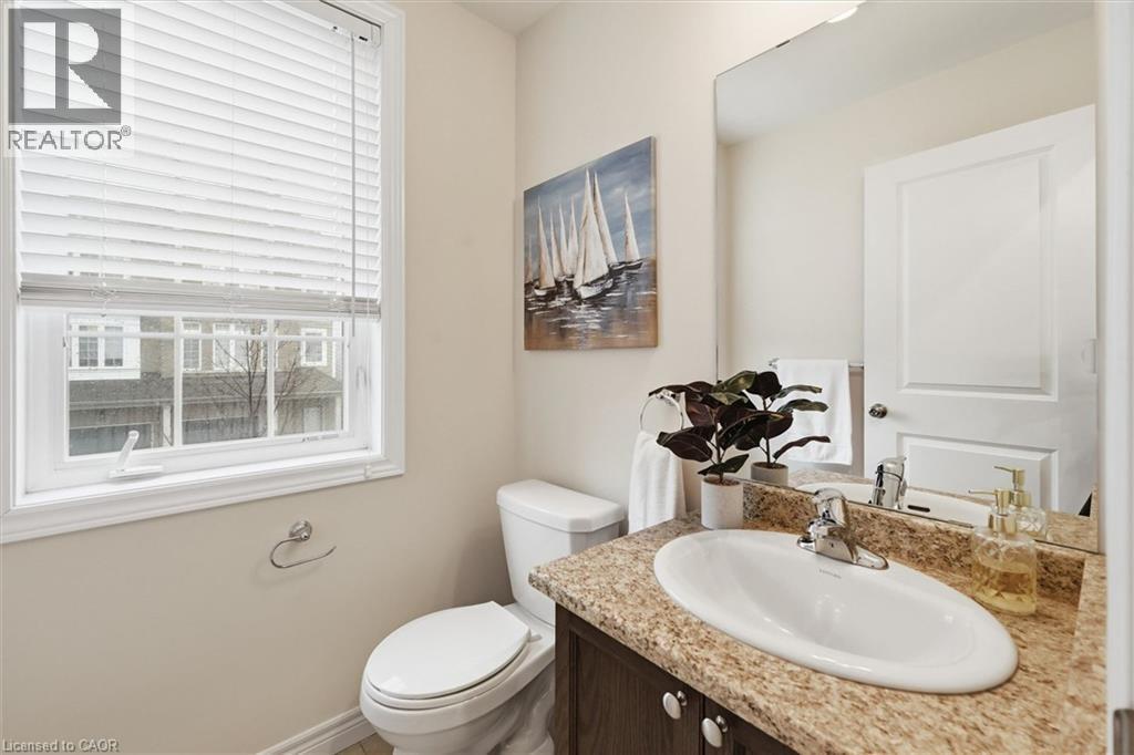 Convenient powder room. - 122 E Dundas Street E Unit# 9, Waterdown, ON - Indoor Photo Showing Bathroom