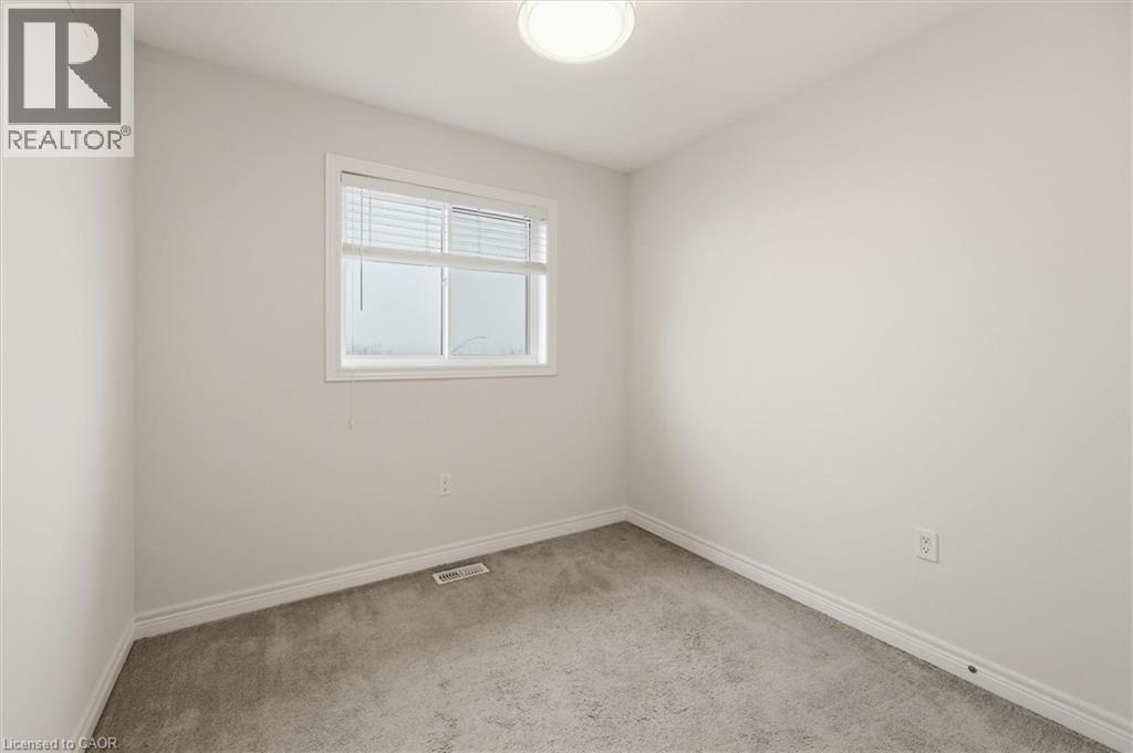 Window and closet - 122 E Dundas Street E Unit# 9, Waterdown, ON - Indoor Photo Showing Other Room