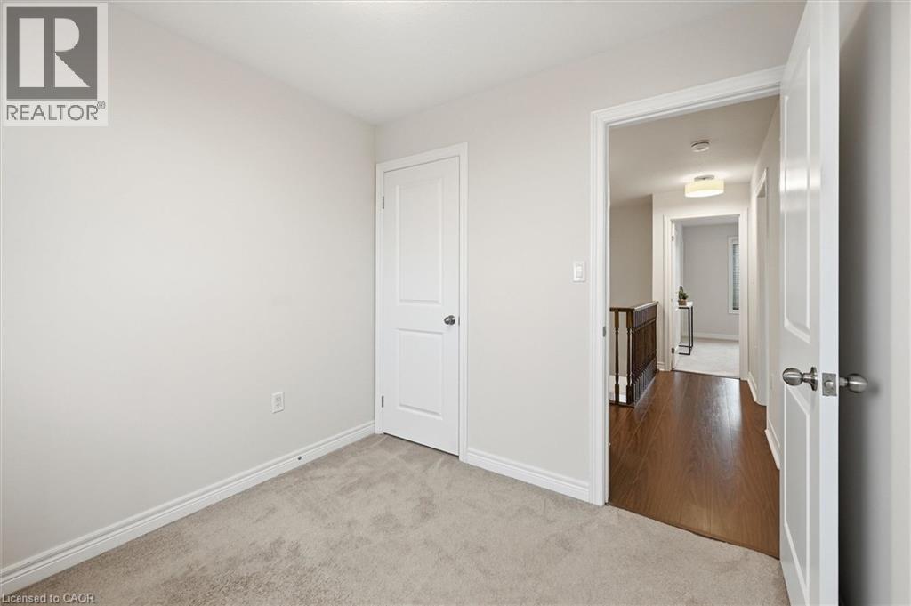 Window and closet. - 122 E Dundas Street E Unit# 9, Waterdown, ON - Indoor Photo Showing Other Room