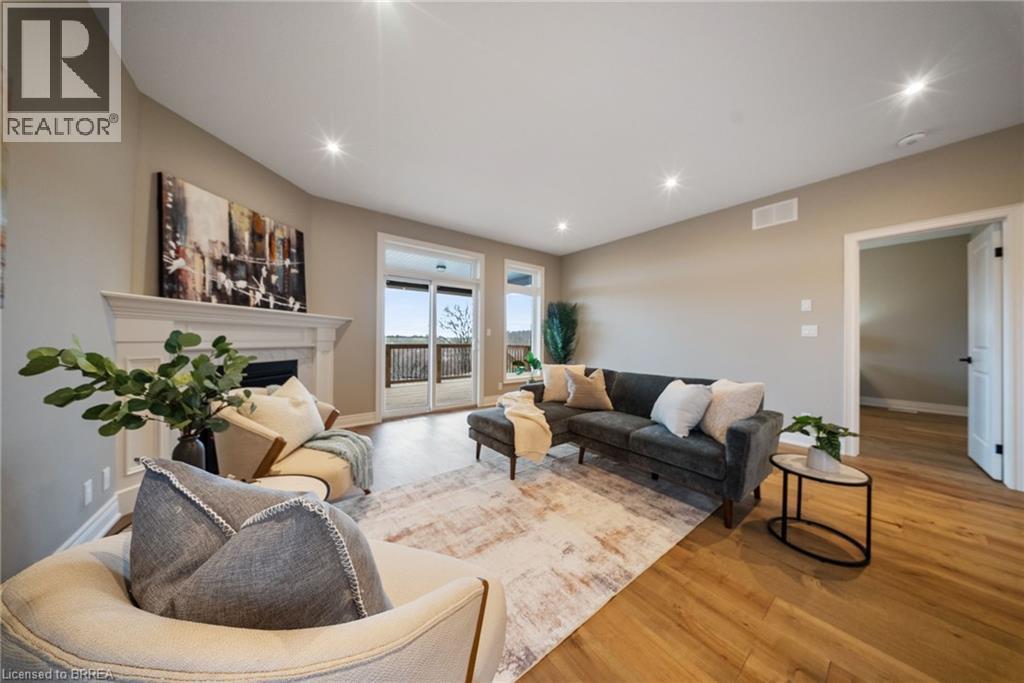 187 Craddock Boulevard, Jarvis, ON - Indoor Photo Showing Living Room With Fireplace