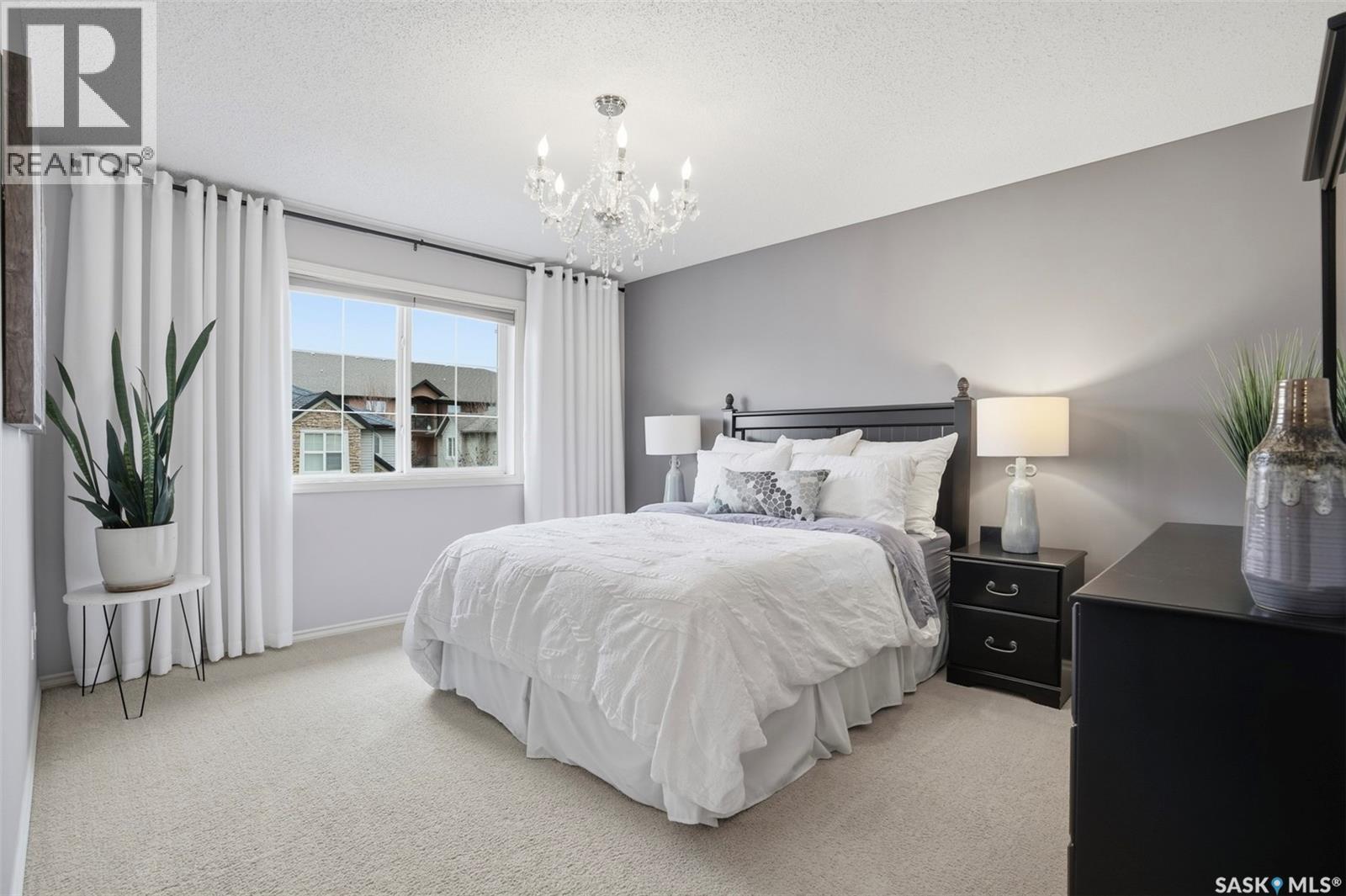 218 105 Lynd Crescent, Saskatoon, SK - Indoor Photo Showing Bedroom