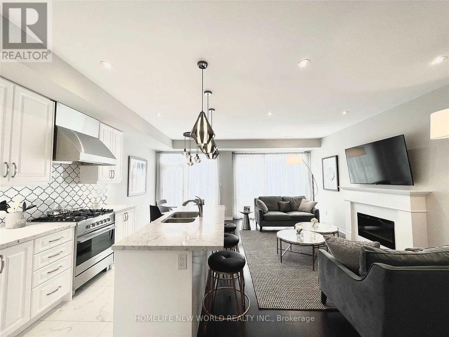 35 Hammersmith Lane, Markham, ON - Indoor Photo Showing Kitchen With Fireplace With Double Sink With Upgraded Kitchen