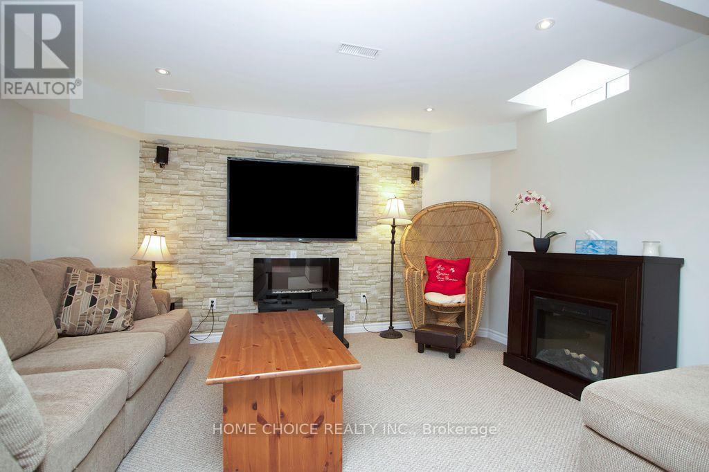 200 Bathgate Crescent, Clarington, ON - Indoor Photo Showing Living Room With Fireplace